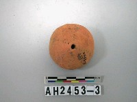 藏品(紅色刺點陶紡輪)的圖片